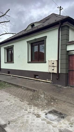 Casă cu 4 camere cu Teren 400 Mp în Piața Cluj