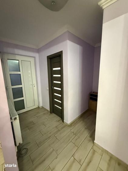 INTRARE IN IPOTESTI: Casa tip duplex P+M - 15