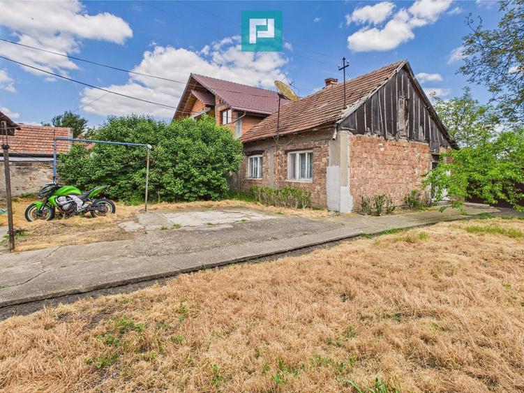 Casă cu 5 camere cu Teren 1130 Mp în Alfa