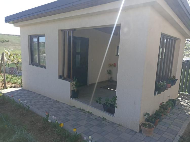 Casă individuală cu 4 camere cu Teren 1500 Mp în Curtești