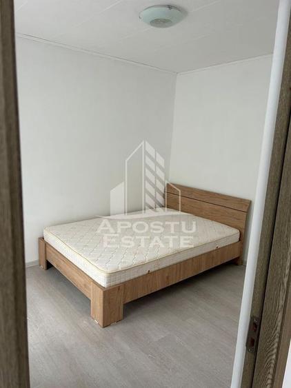 Apartament cu 2 camere semidecomandat, mobilat în Dâmbovița