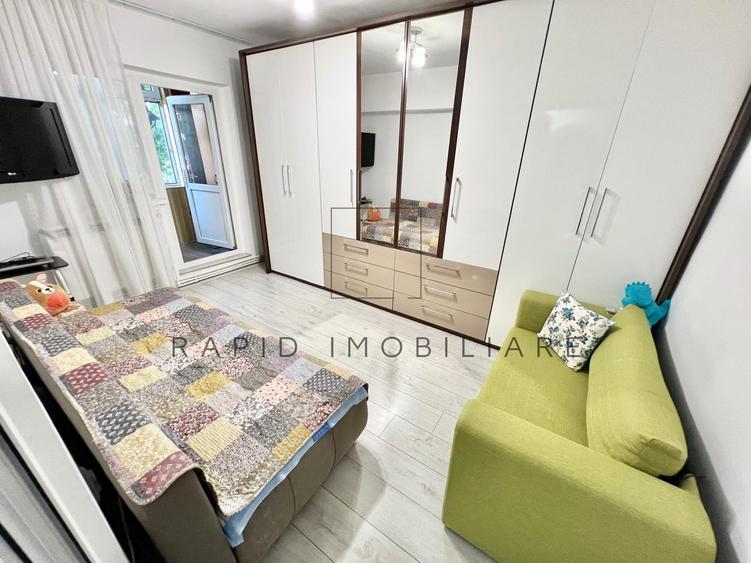 Apartament cu 4 camere decomandat în