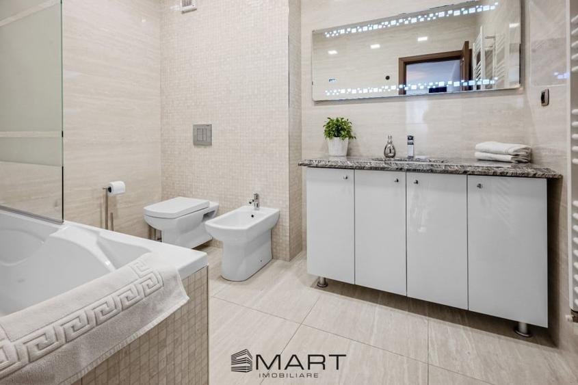 Apartament cu 4 camere decomandat în Tractorul