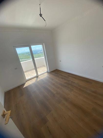 Apartament cu 3 camere decomandat în Moșnița Nouă