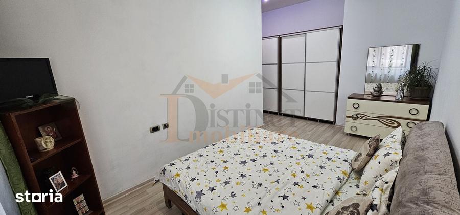 Apartament cu 3 camere decomandat în Tractorul