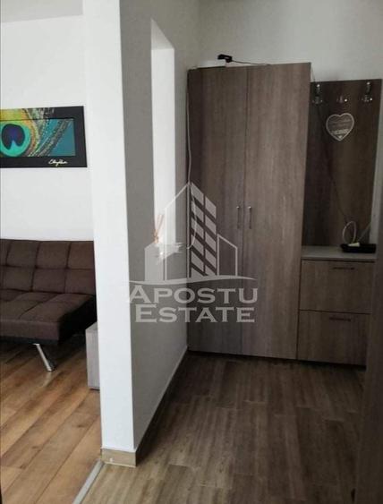 Apartament cu 2 camere semidecomandat, mobilat în Dumbrăvița