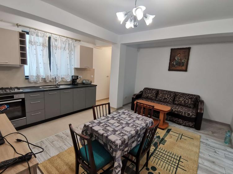 Apartament cu 2 camere semidecomandat, mobilat în Bucium
