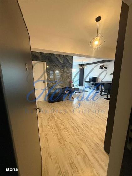 Apartament cu 3 camere semidecomandat, mobilat în Central