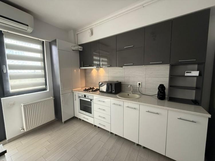 Apartament cu 2 camere semidecomandat, mobilat în Central