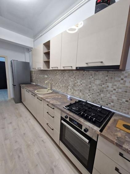 Apartament cu 2 camere decomandat, mobilat în Universitate
