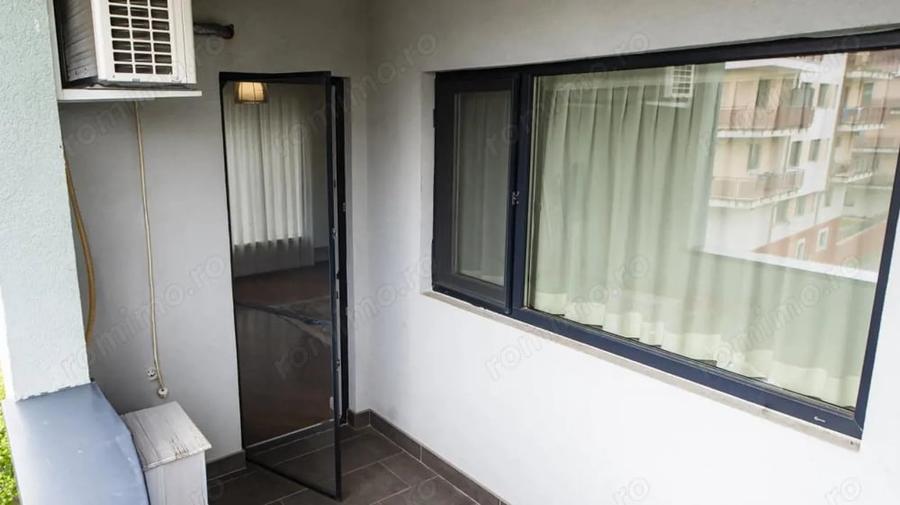 Apartament cu 2 camere semidecomandat, mobilat în Borhanci