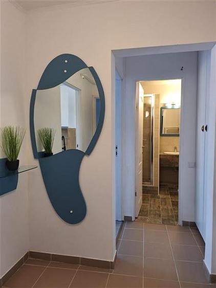 Apartament cu 2 camere decomandat în Podul de Fier