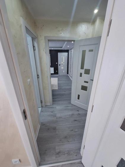 Apartament cu 3 camere semidecomandat în Dâmbovița