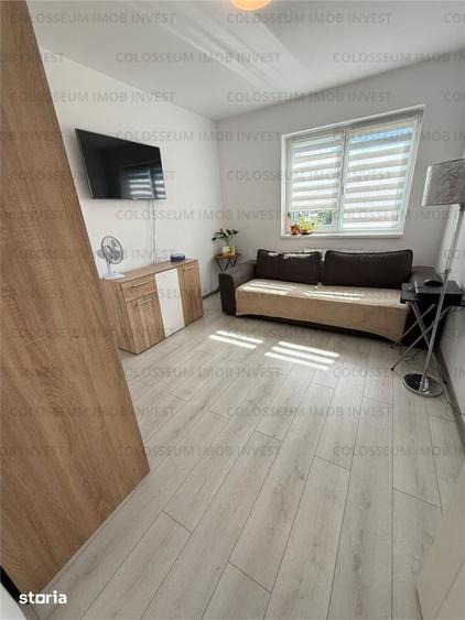 Apartament cu 3 camere decomandat în Tractorul