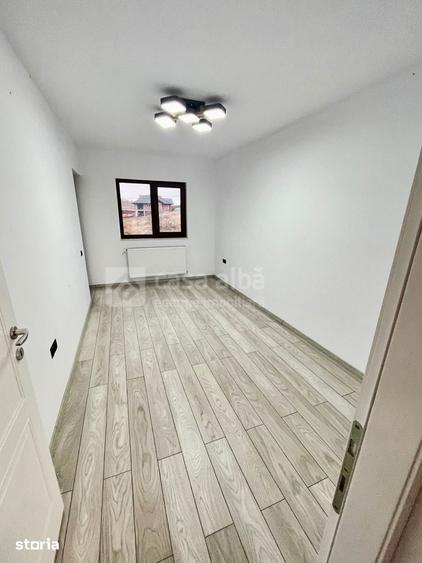 Casă cu 4 camere cu Teren 500 Mp în Bucium