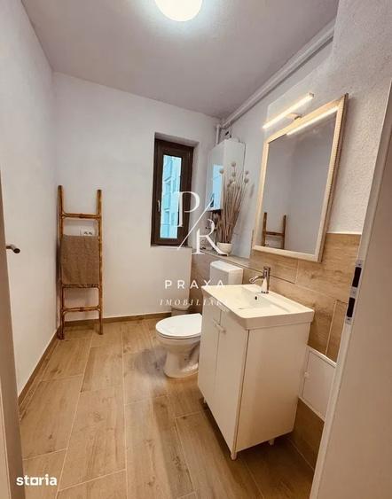 Apartament cu 3 camere semidecomandat în Borhanci