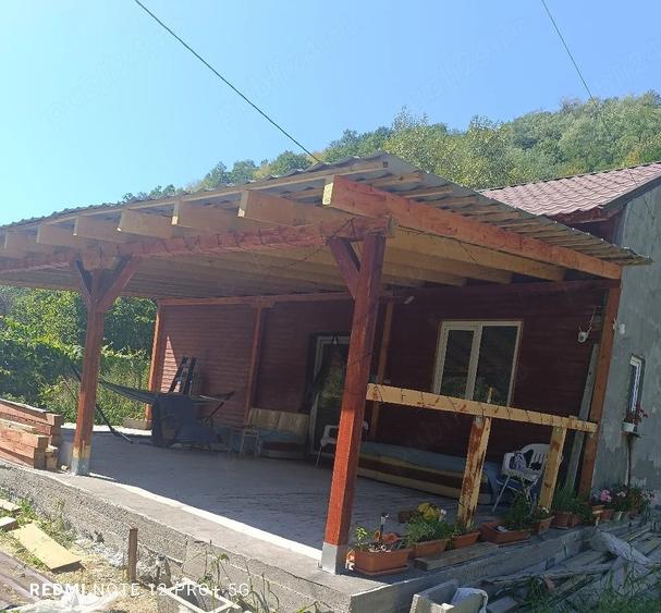Casă cu Teren 1046 Mp în Hărțăgani