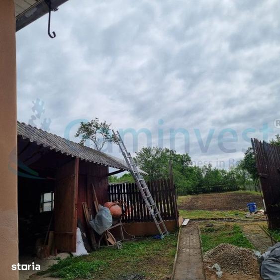 Casă cu 5 camere cu Teren 1611 Mp în Răbăgani