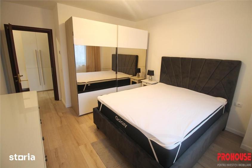 Bloc nou - langa Universitatea Bacovia - chirie 2 camere - mobilat si - 5