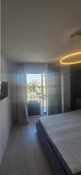 Apartament cu 3 camere decomandat în Romană