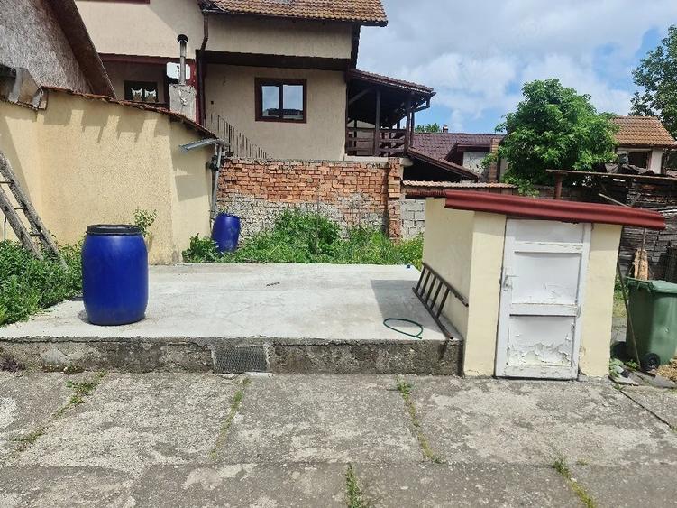 Casă cu Teren 900 Mp în Central