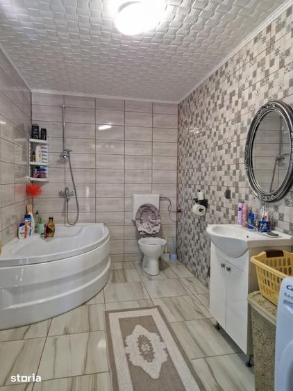 Casă cu 4 camere cu Teren 259 Mp în Comana