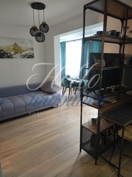 Apartament cu 2 camere semidecomandat, mobilat în Florești