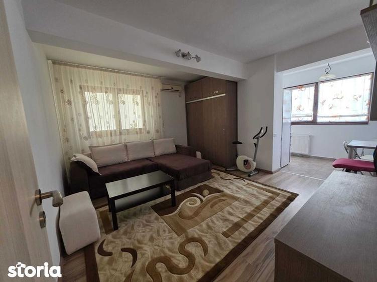 Apartament cu 2 camere semidecomandat, mobilat în Central