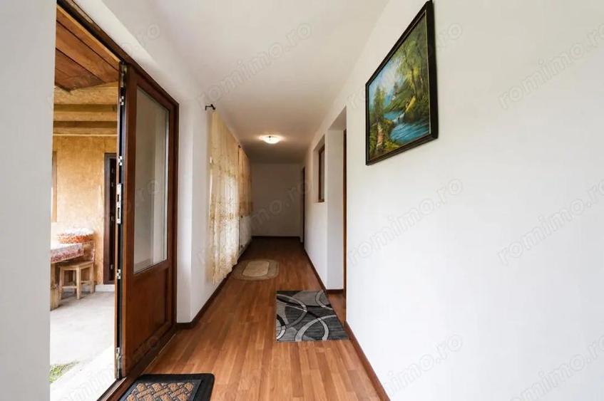 Casă cu 2 camere cu Teren 1421 Mp în Bistrița