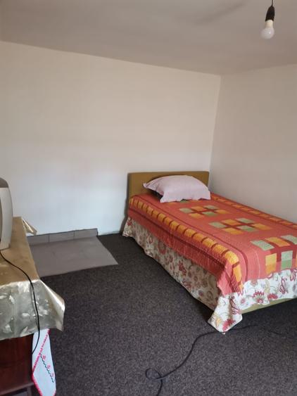 Casă cu 2 camere cu Teren 400 Mp în Central
