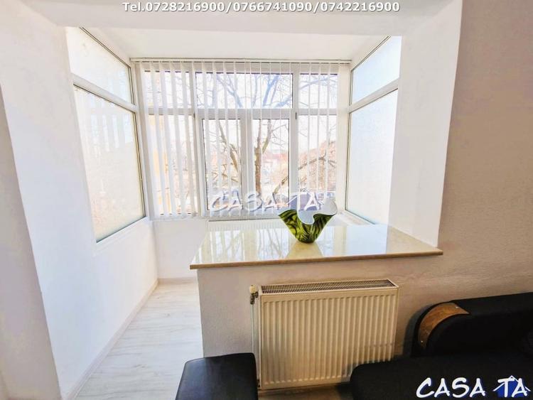 Apartament cu 2 camere semidecomandat, mobilat în Central