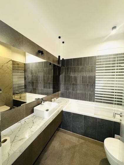 Apartament cu 2 camere decomandat, mobilat în Tractorul