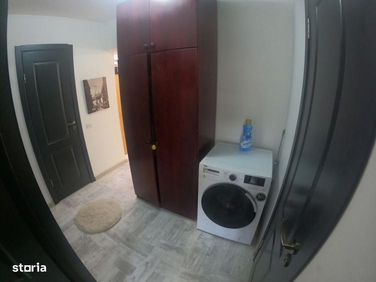 Apartament cu 4 camere decomandat în Uiești