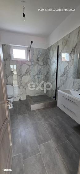 Casă cu 8 camere cu Teren 1388 Mp în Voinești