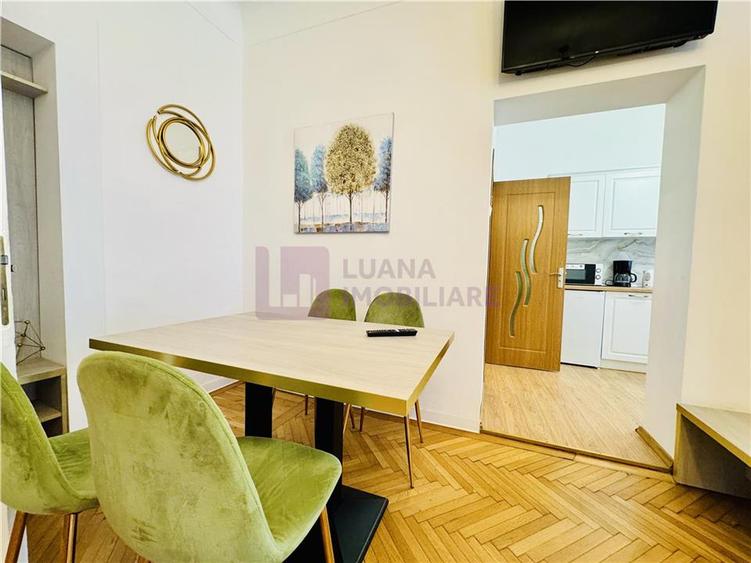 Apartament cu 3 camere semidecomandat, mobilat în Ultracentral