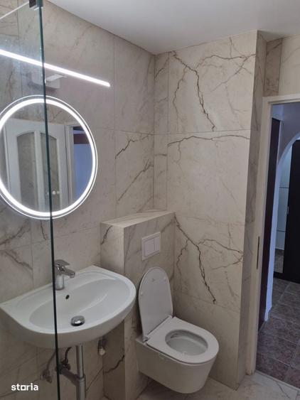 Apartament cu 3 camere decomandat în Rădeana