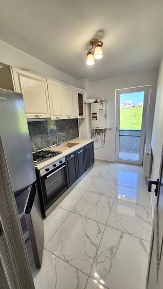 Apartament cu 2 camere decomandat, mobilat în Bucium