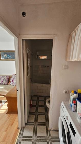 Apartament cu 2 camere nedecomandat în Caragiale