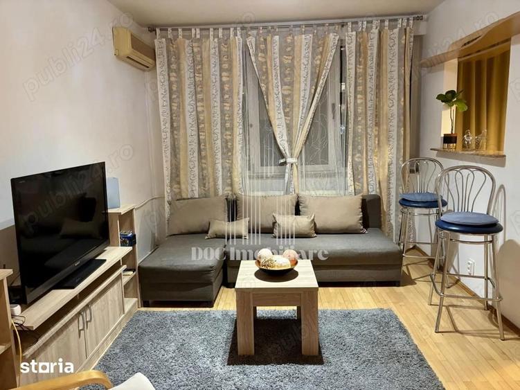 Apartament cu 2 camere semidecomandat, mobilat în Centrul Civic
