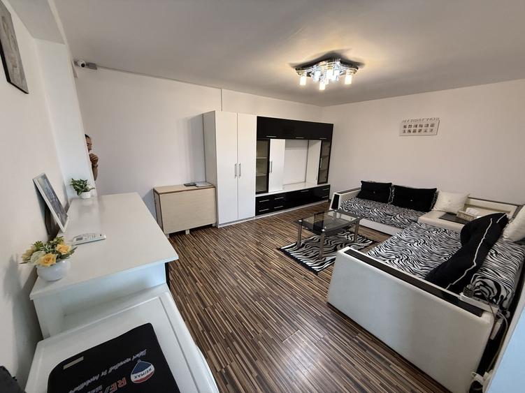 Apartament cu 2 camere semidecomandat, mobilat în Central