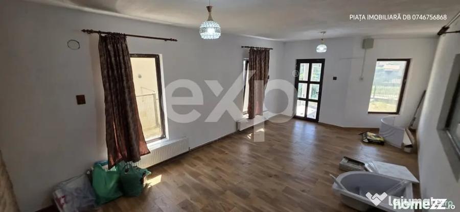 Casă cu 3 camere cu Teren 1000 Mp în Răzvad