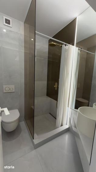 vanzare apartament 3 camere Cortina North parcare si boxe - 13
