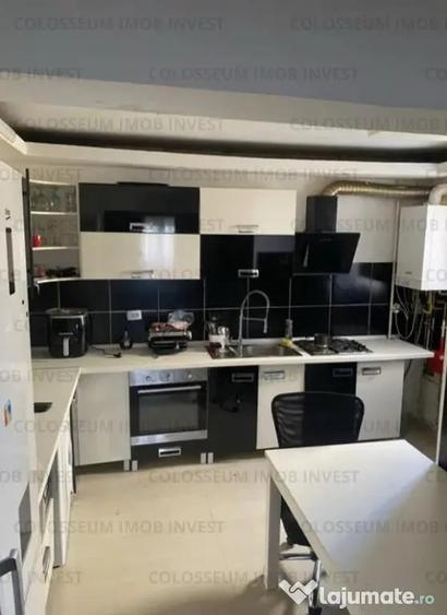 Apartament cu 4 camere decomandat în Tractorul