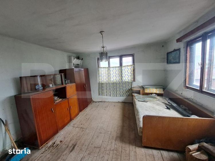 Casă cu 2 camere cu Teren 1400 Mp în Central