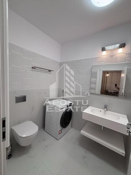 Apartament cu 2 camere semidecomandat, mobilat în Central