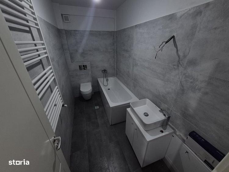 Apartament cu 7 camere decomandat în Bucium