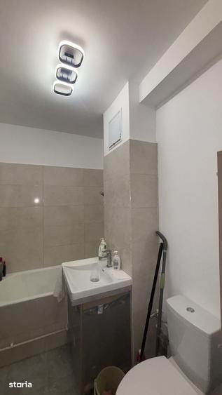 Apartament cu 3 camere decomandat în Calea București