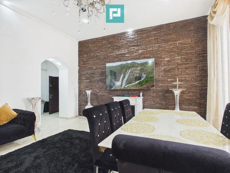 Apartament cu 4 camere semidecomandat în Central