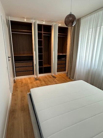 Apartament cu 2 camere semidecomandat, mobilat în Podu Roș