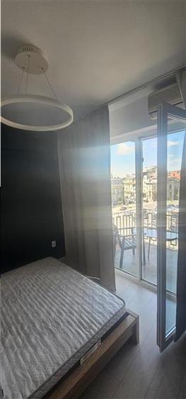 Apartament cu 3 camere decomandat în Romană